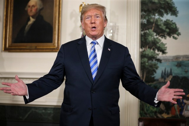 President Donald Trump answers questions on the Iran nuclear deal. Photo:  Oliver Contreras / SIPA USA