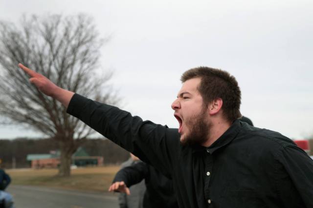 White nationalists clash with counter-demonstrators before the start of a speech by Richard Spencer. Credit:  Scott Olson / Getty