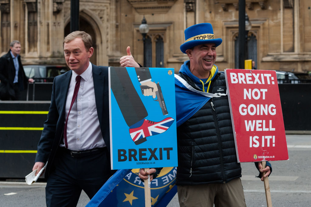 Tim Farron and pro-EU activist Steve Bray  outside the Houses of Parliament. (Photo: Wiktor Szymanowicz / Barcroft Media via Getty Images)