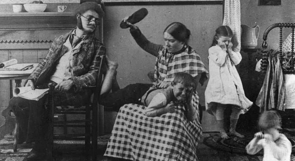 circa 1891:  A little boy is spanked by his mother with a shoe.  (Photo by Hulton Archive/Getty Images)