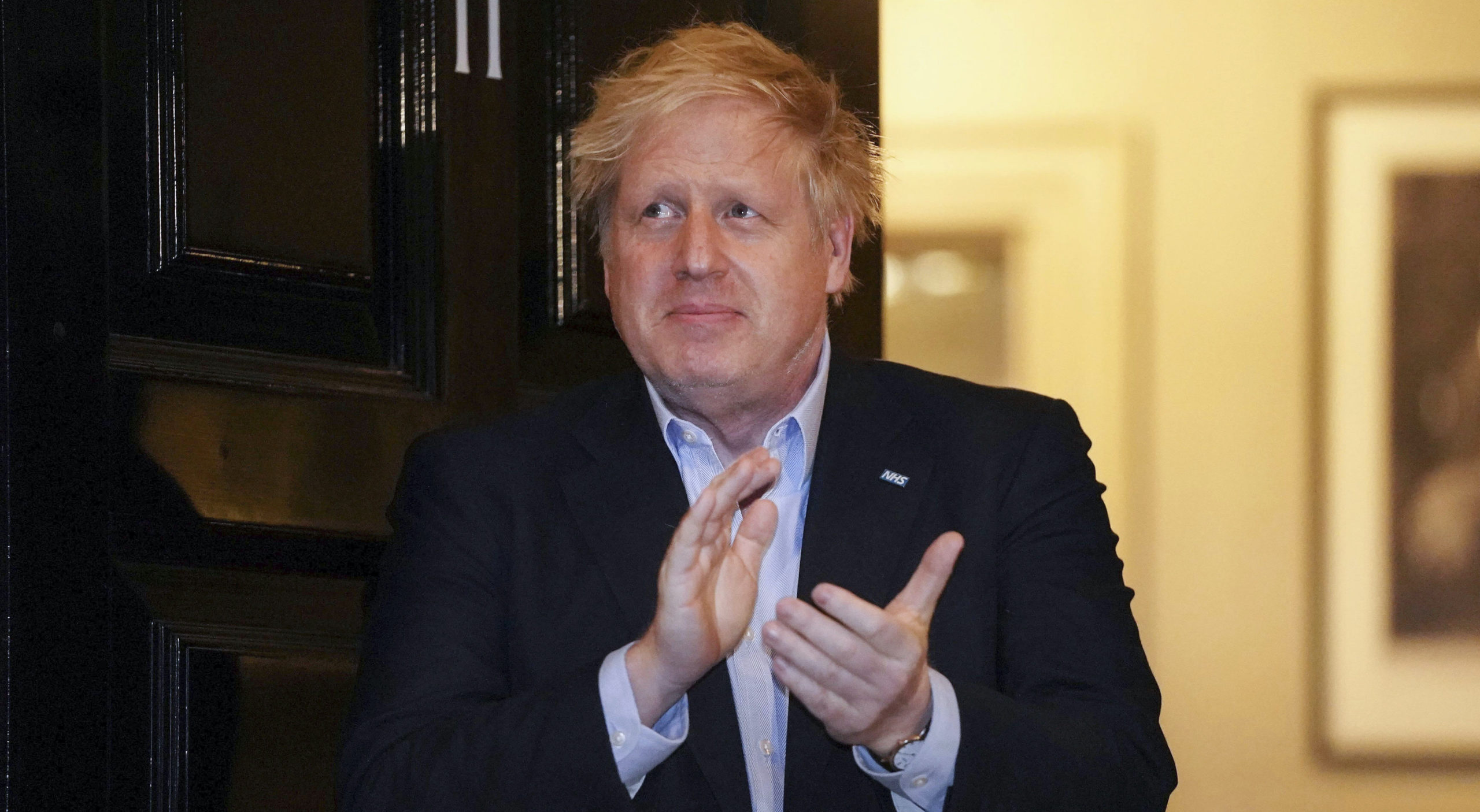Boris Johnson clapping outside 11 Downing Street for NHS workers