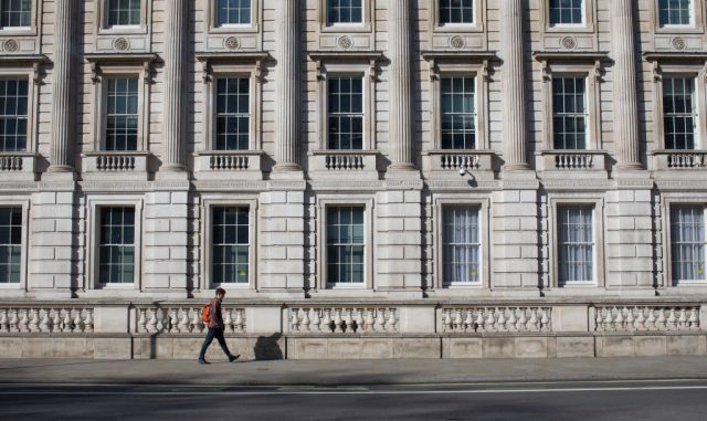 The NSC has gone missing:  man walks down an otherwise empty Whitehall during lockdown. (Photo by Dan Kitwood/Getty Images)