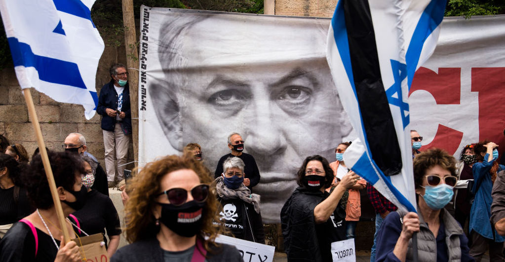 Anti-Netanyahu protesters demonstrating on the eve of the April 9 Israeli election