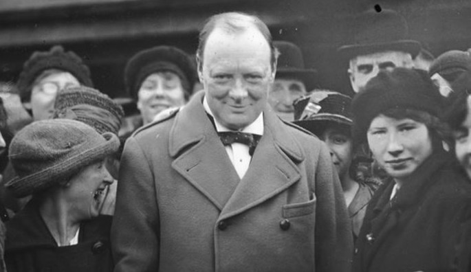 Winston Churchill with female workers at Georgetown's filing works near Glasgow in 1918. Credit: History Hit