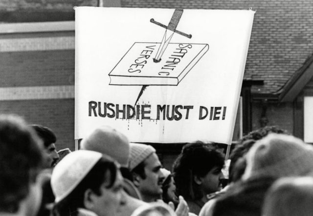 A 1989 protest against Salman Rushdie's book, The Satanic Verses. Credit: Staff/Mirrorpix/Getty Images