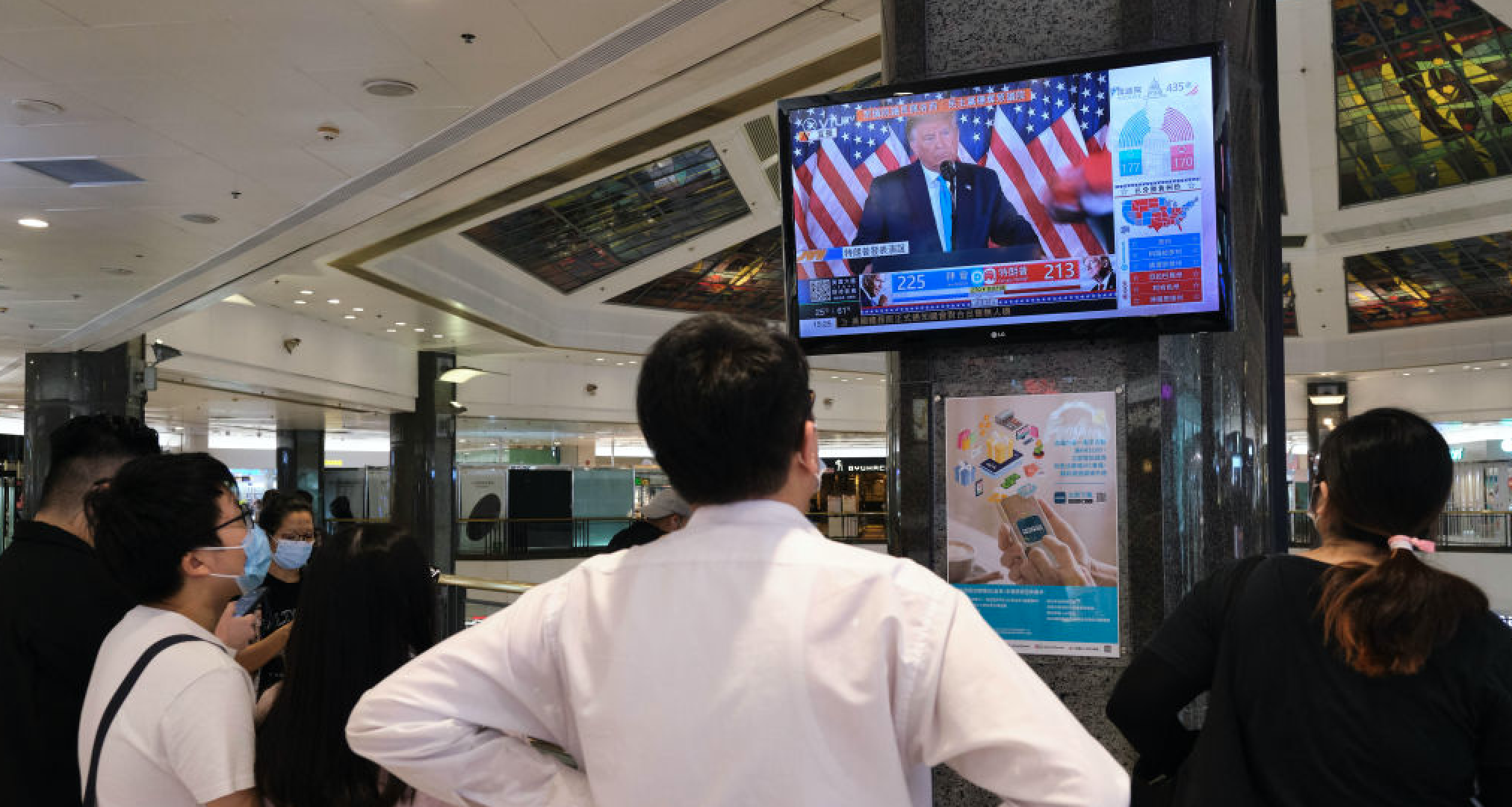 The world is watching: US election broadcast in Hong Kong shopping centre  