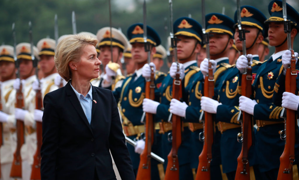 Ursula von der Leyen reviews troops in Beijing.(HOW HWEE YOUNG/AFP via Getty Images)