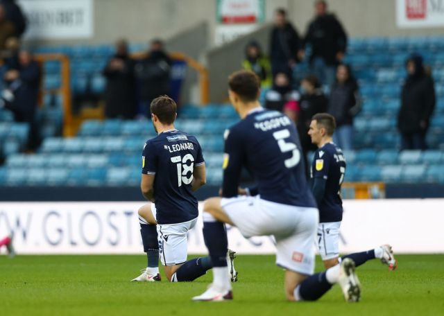 Millwall players taking the knee on Saturday. Photo by Jacques Feeney/Getty Images