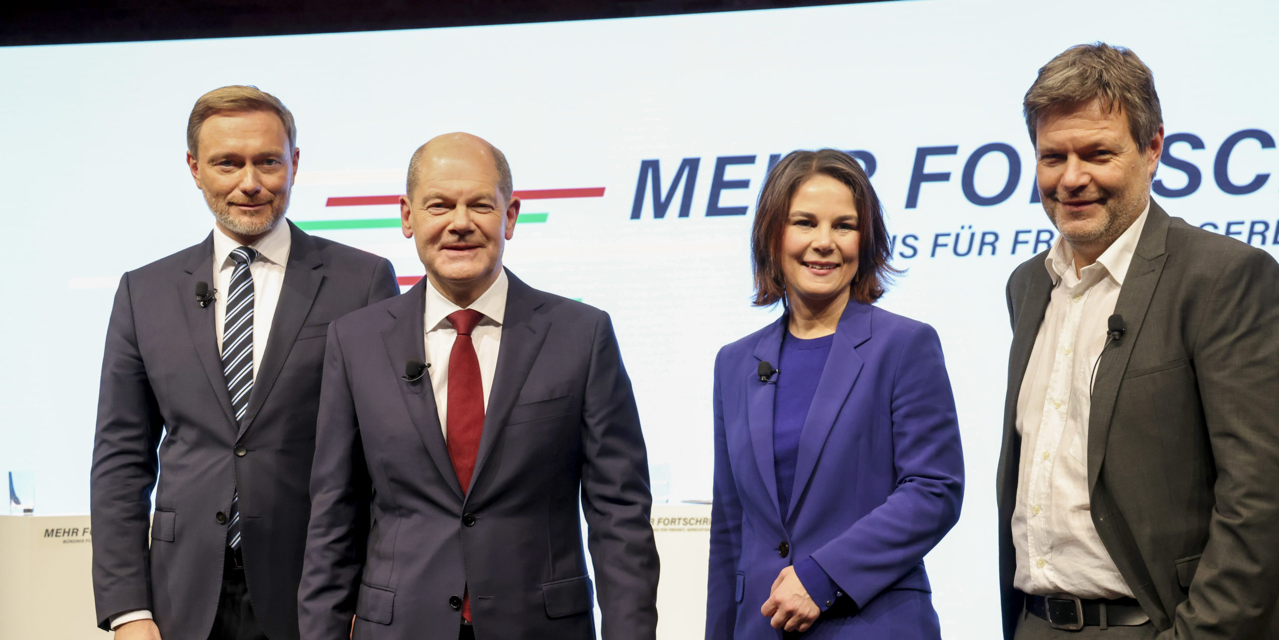 Olaf Scholz, second left, with Christian Lindner, left, Annalena Baerbock, second right, and Robert Habeck