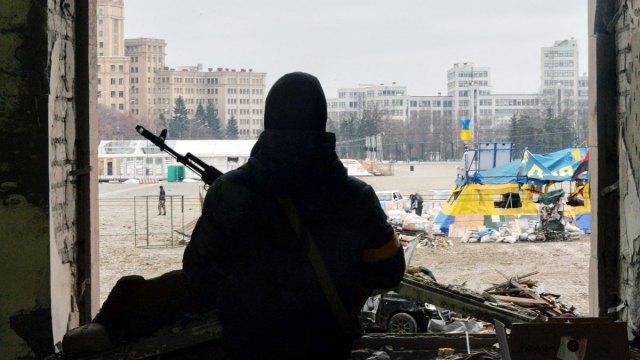 Will he be putting his gun away soon? Photo by SERGEY BOBOK/AFP via Getty Images.
