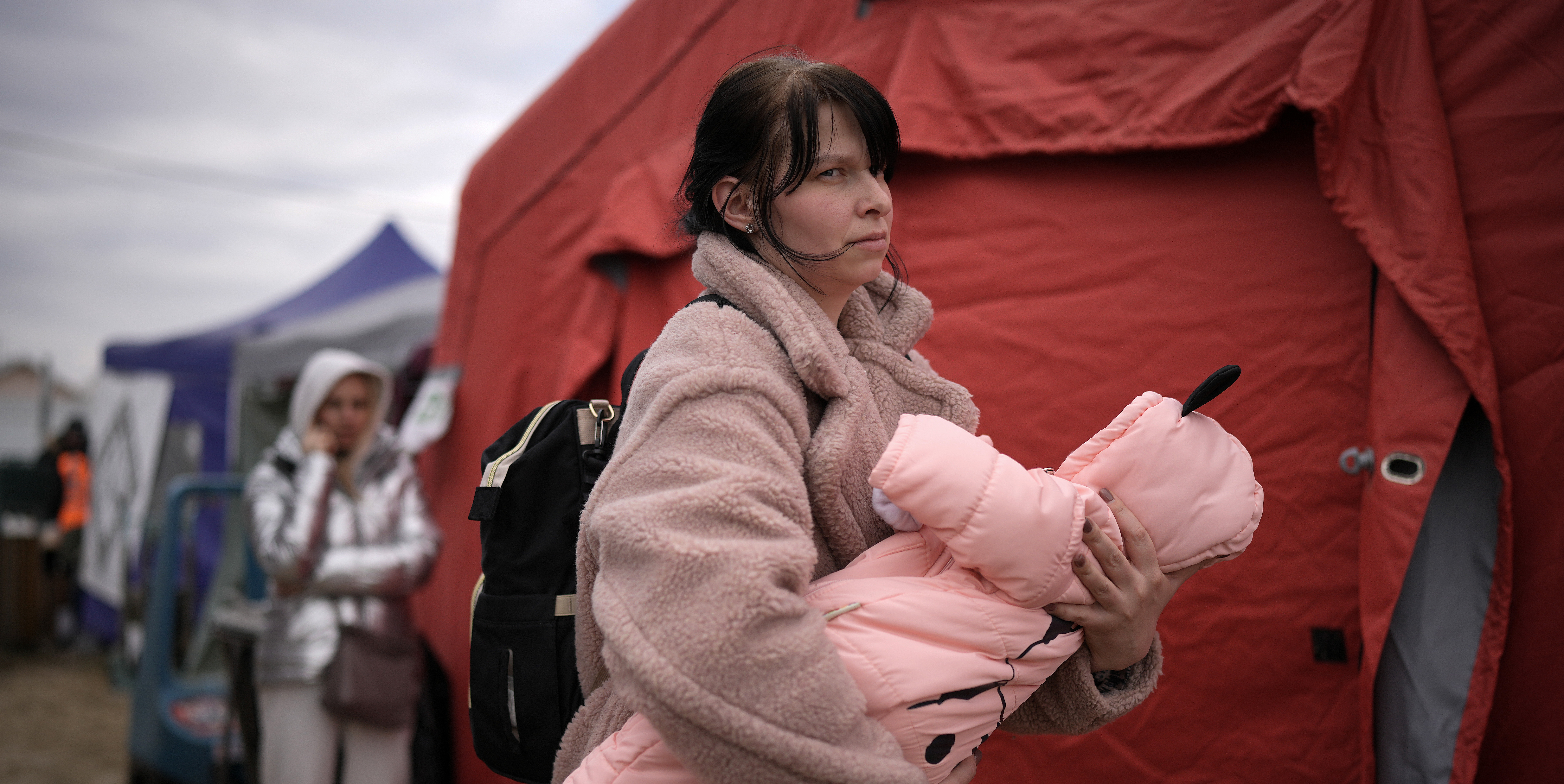Refugees fleeing Ukraine arrive at the Slovakian border. Credit: Getty
