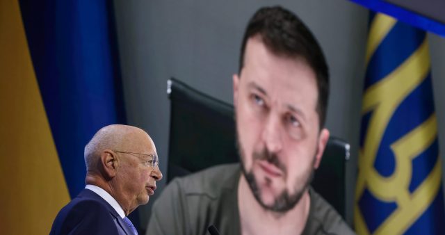 Klaus Schwab, chairman of WEF, speaks on stage after Volodymyr Zelenskyy. Credit: Getty