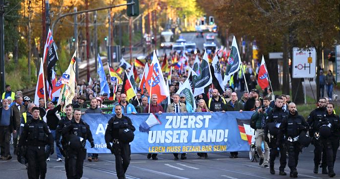 Supporters take part in an "Our Country First!" demonstration in the eastern state of Thuringia