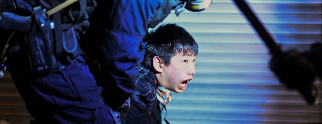 The monster's claw: a pro-democracy supporter in Kowloon. Credit: Manan Vatsyayana/AFP/Getty Images
