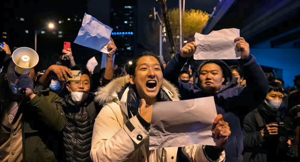 A protester in Beijing. Photograph: Kevin Frayer/Getty Images