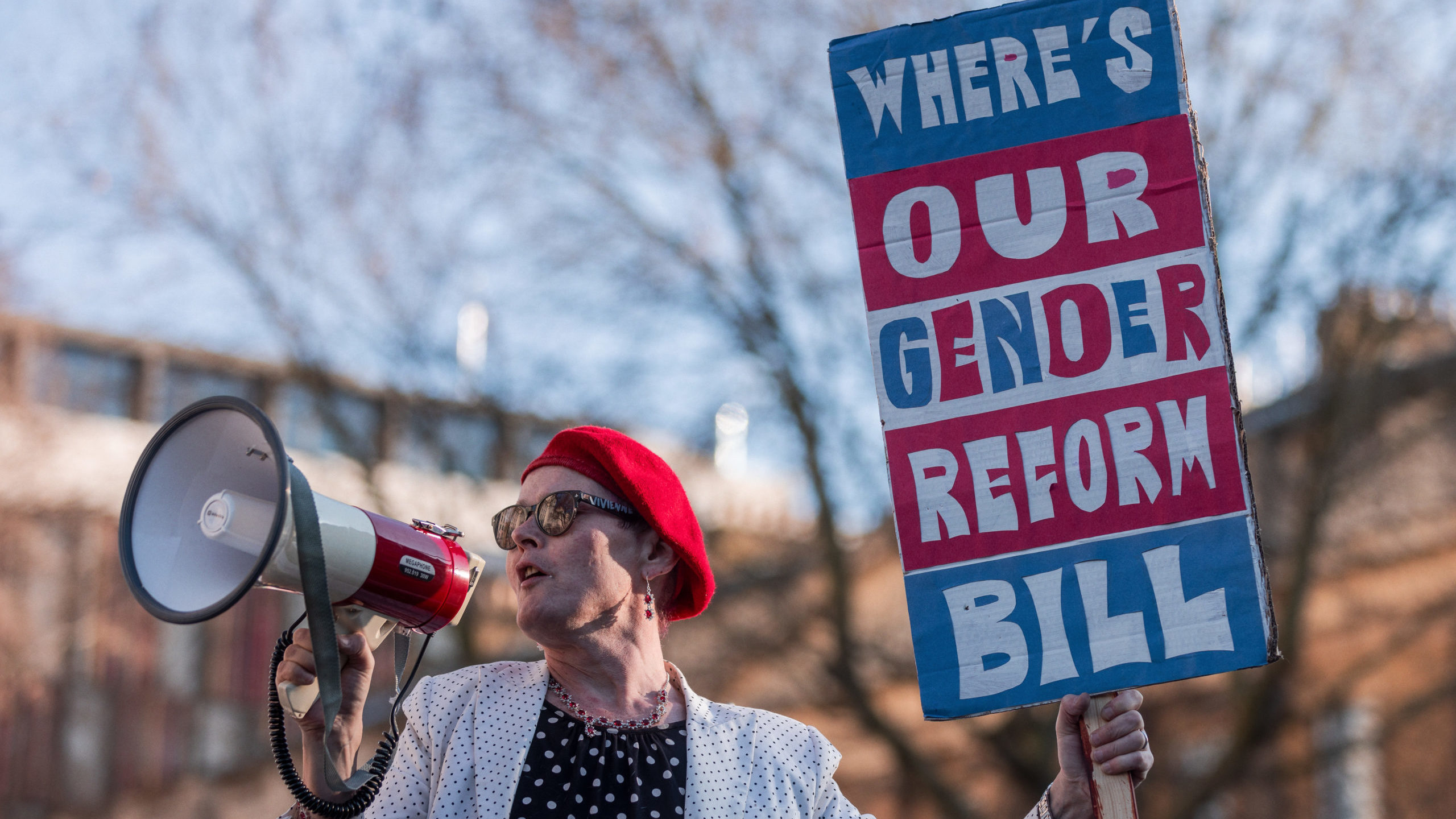Sarah Jane Baker addresses a protest opposite Downing Street on 21 January. Credit: Getty.