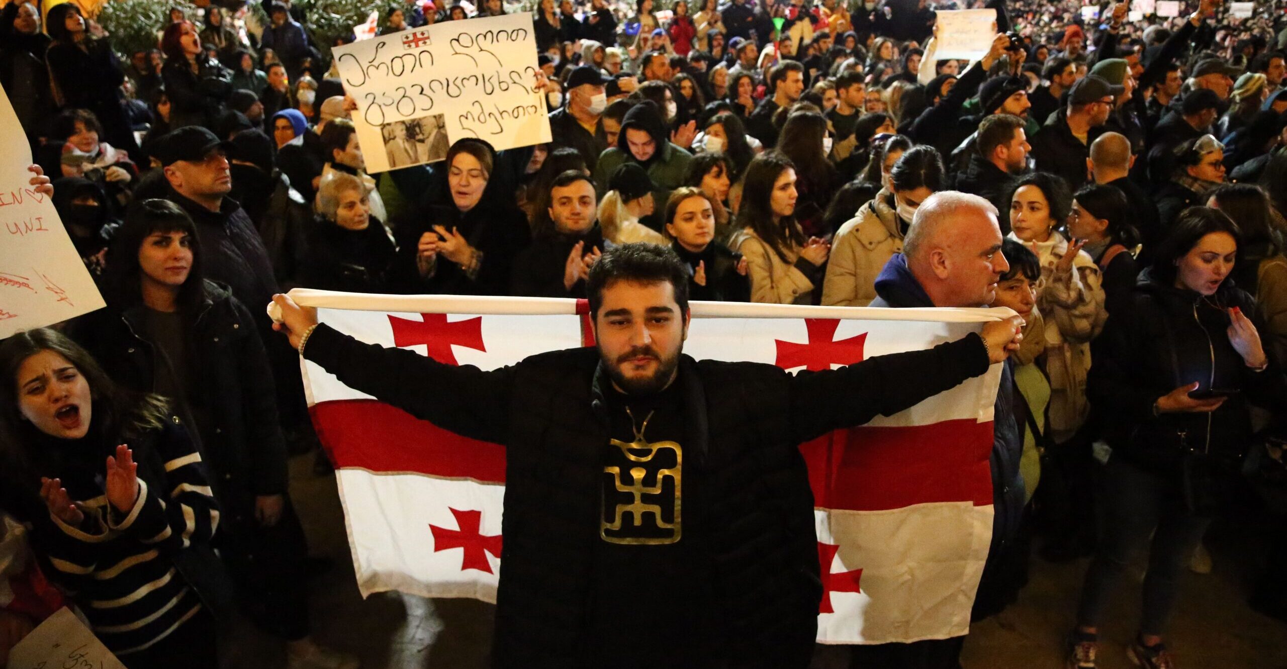 Georgian protestors call for the government to follow a 'pro-Western' path this month. Credit: Getty.