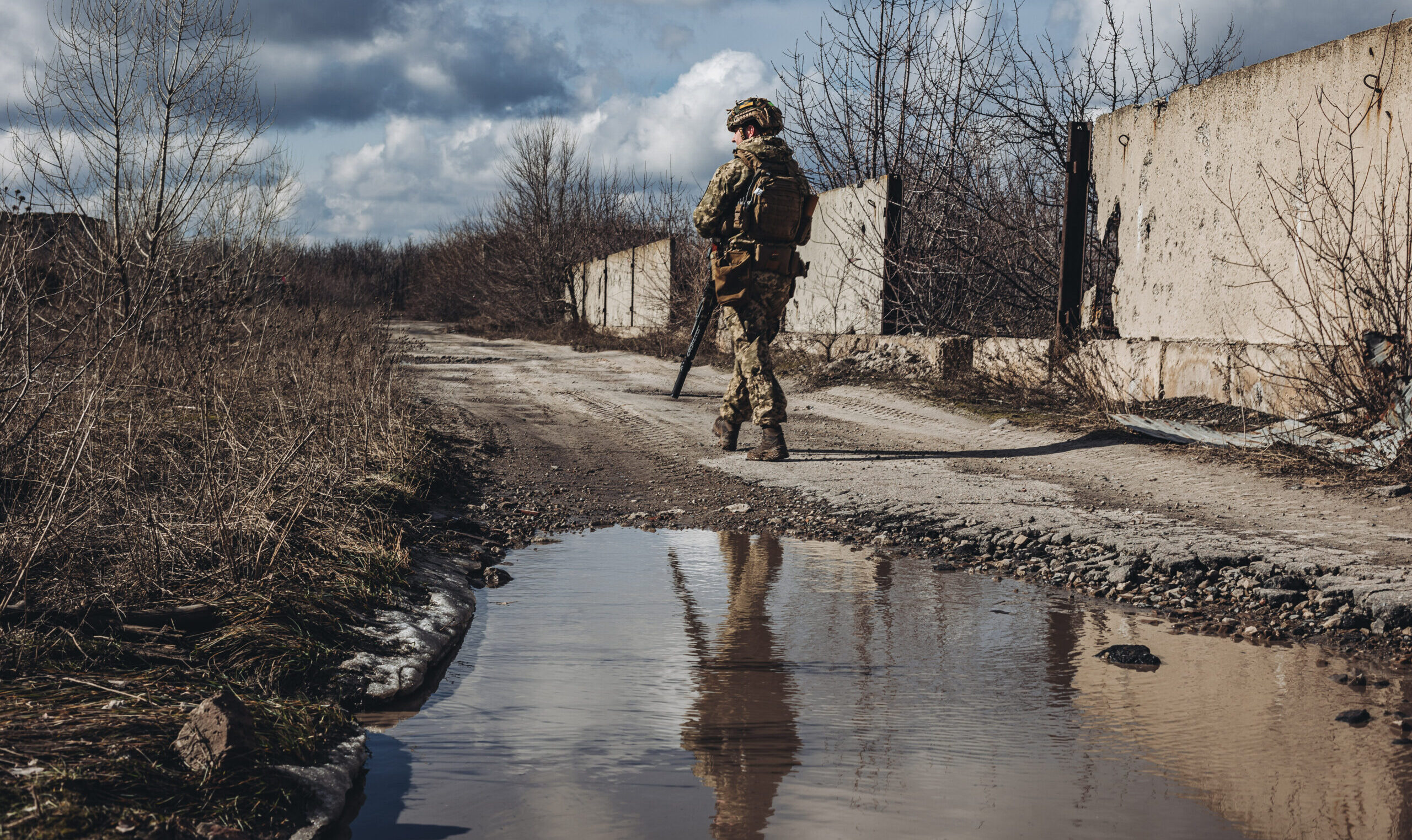 A Ukrainian soldier walks along the front line  in Avdiivka. Credit: Getty