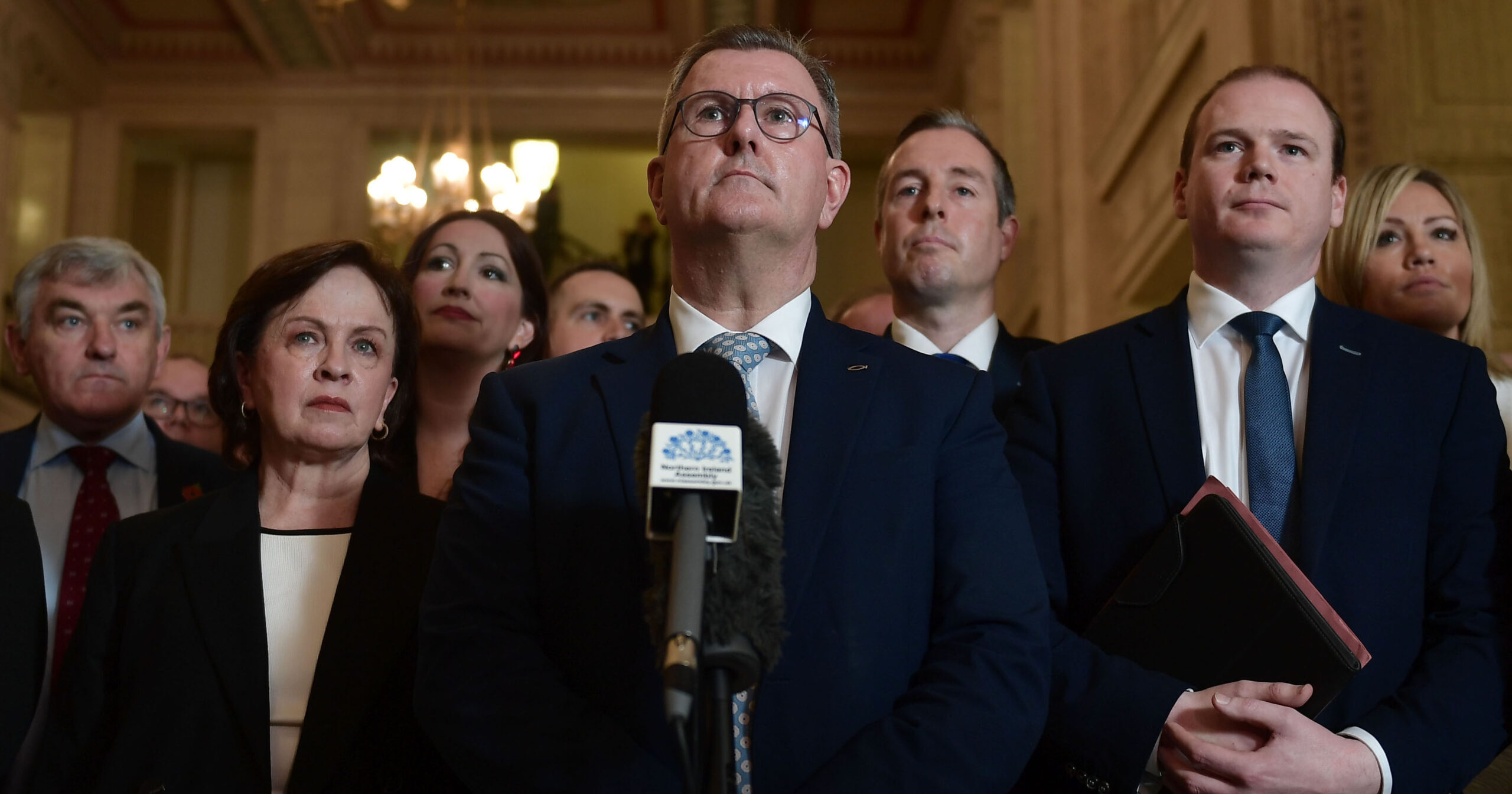 DUP leader Sir Jeffrey Donaldson alongside party members at Stormont last year. Credit: Getty