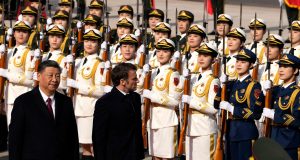 Emmanuel Macron sidesteps European division on China visit