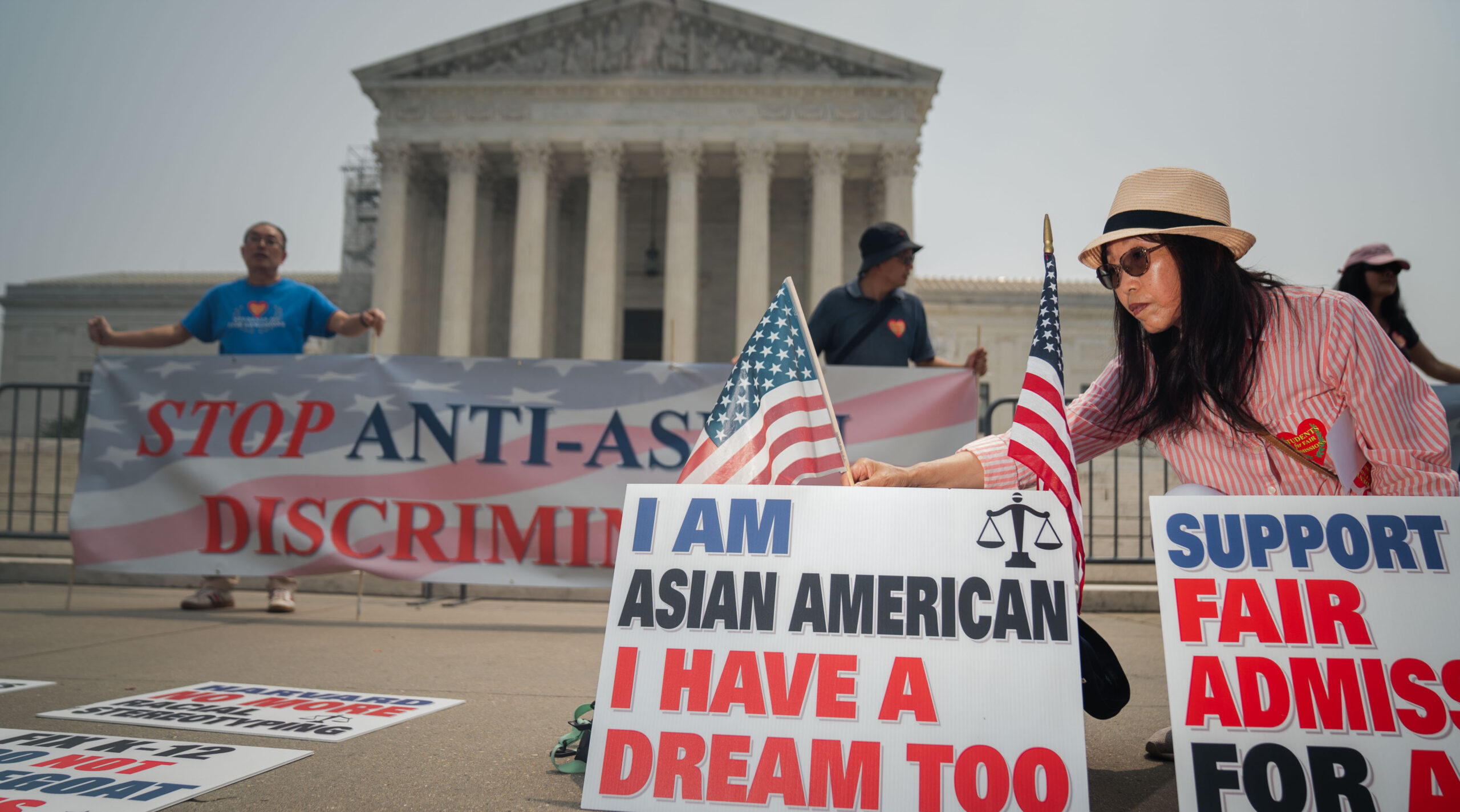 Asian American Coalition for Education protesters rally outside of the Supreme Court. Credit: Getty
