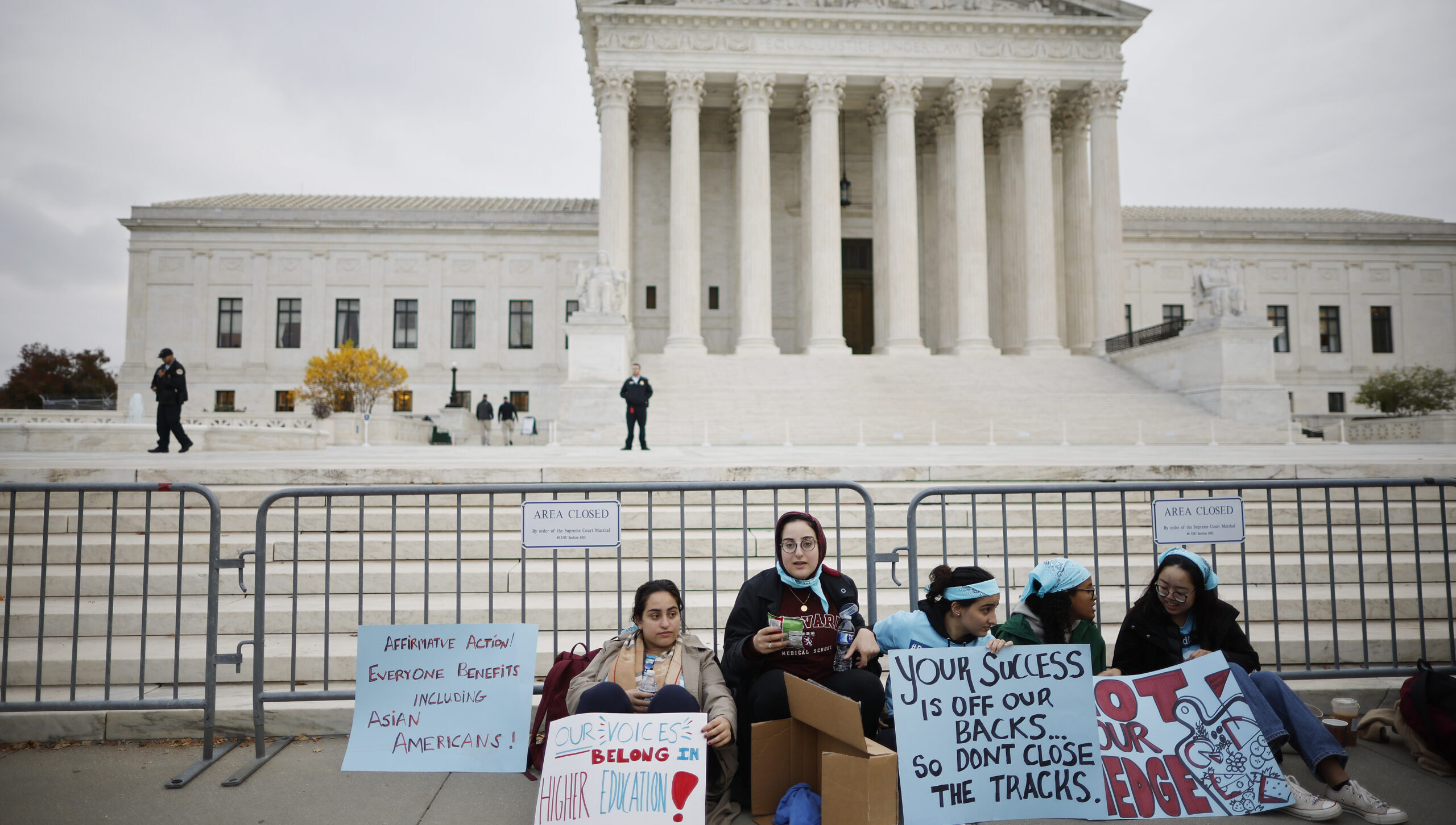Proponents for affirmative action sit outside the Supreme Court. Credit: Getty