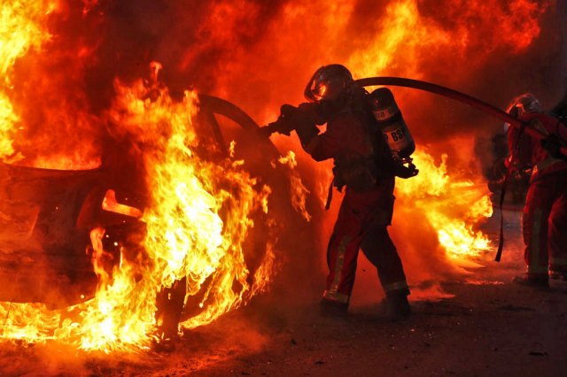 The burning car represents impotent rage(Alaattin Dogru/Anadolu Agency via Getty)