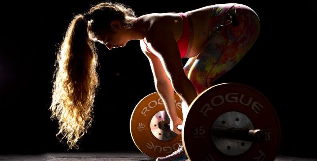 CrossFitting alone. (Al Bello/Getty Images)