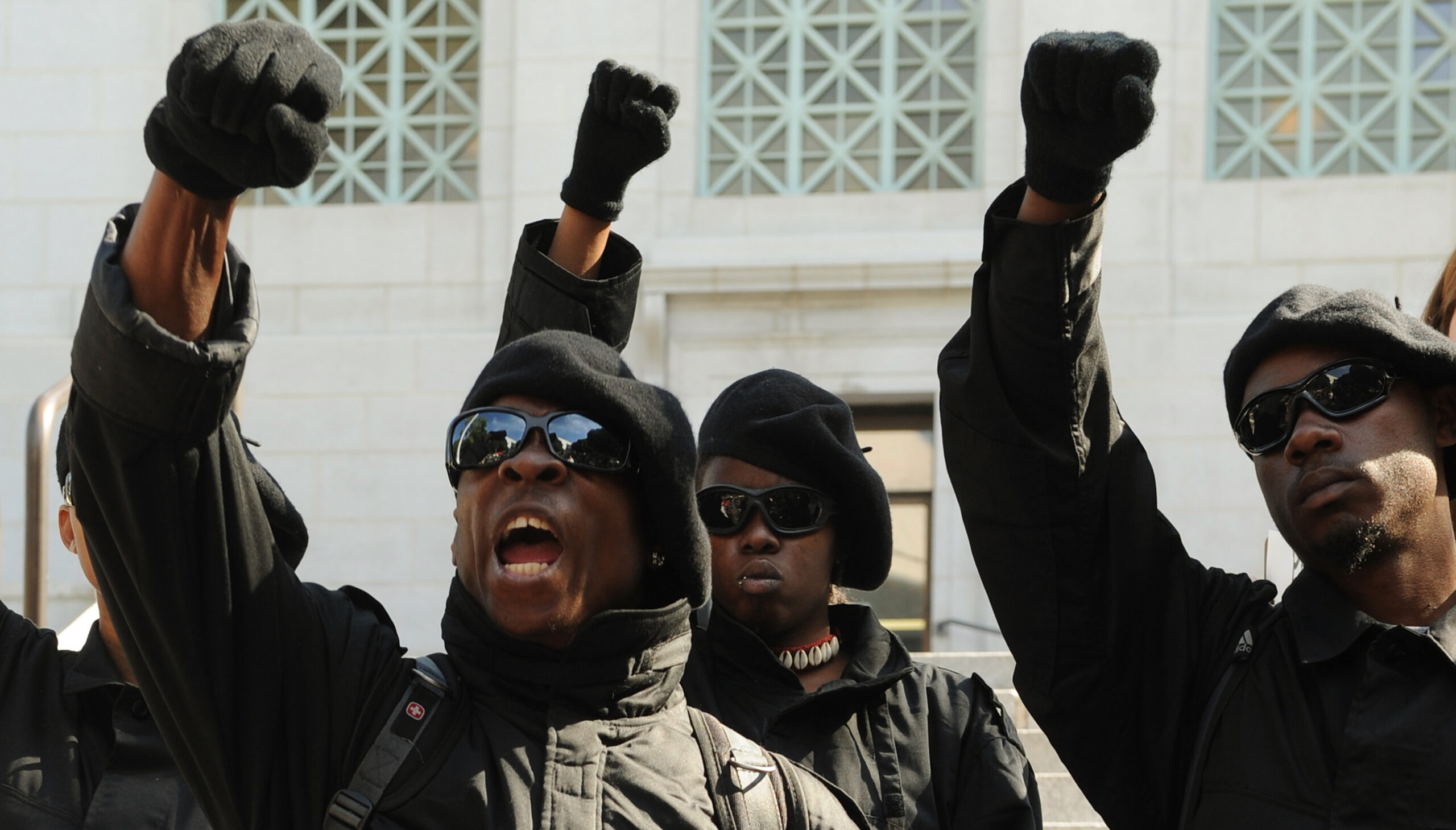 Members of an American black nationalist organisation called the New Black Panthers. Credit: Getty