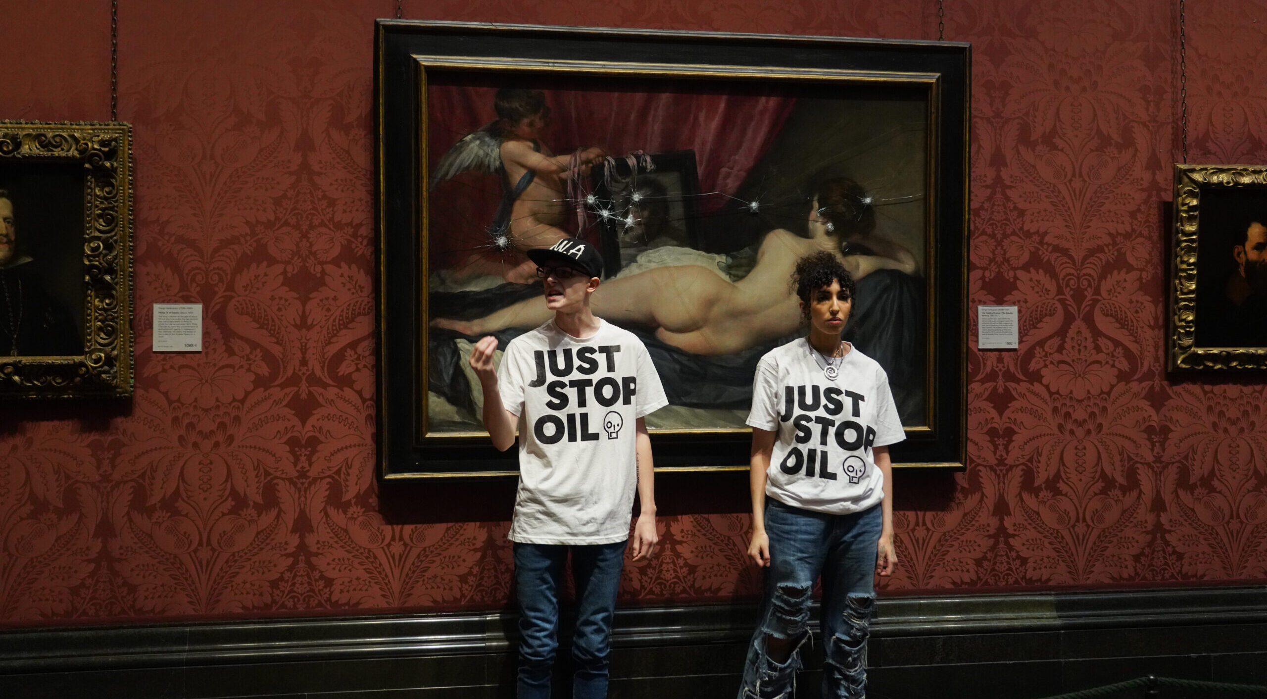 Just Stop Oil activists target the Diego Velázquez Venus in the National Gallery on Monday. Credit: Getty