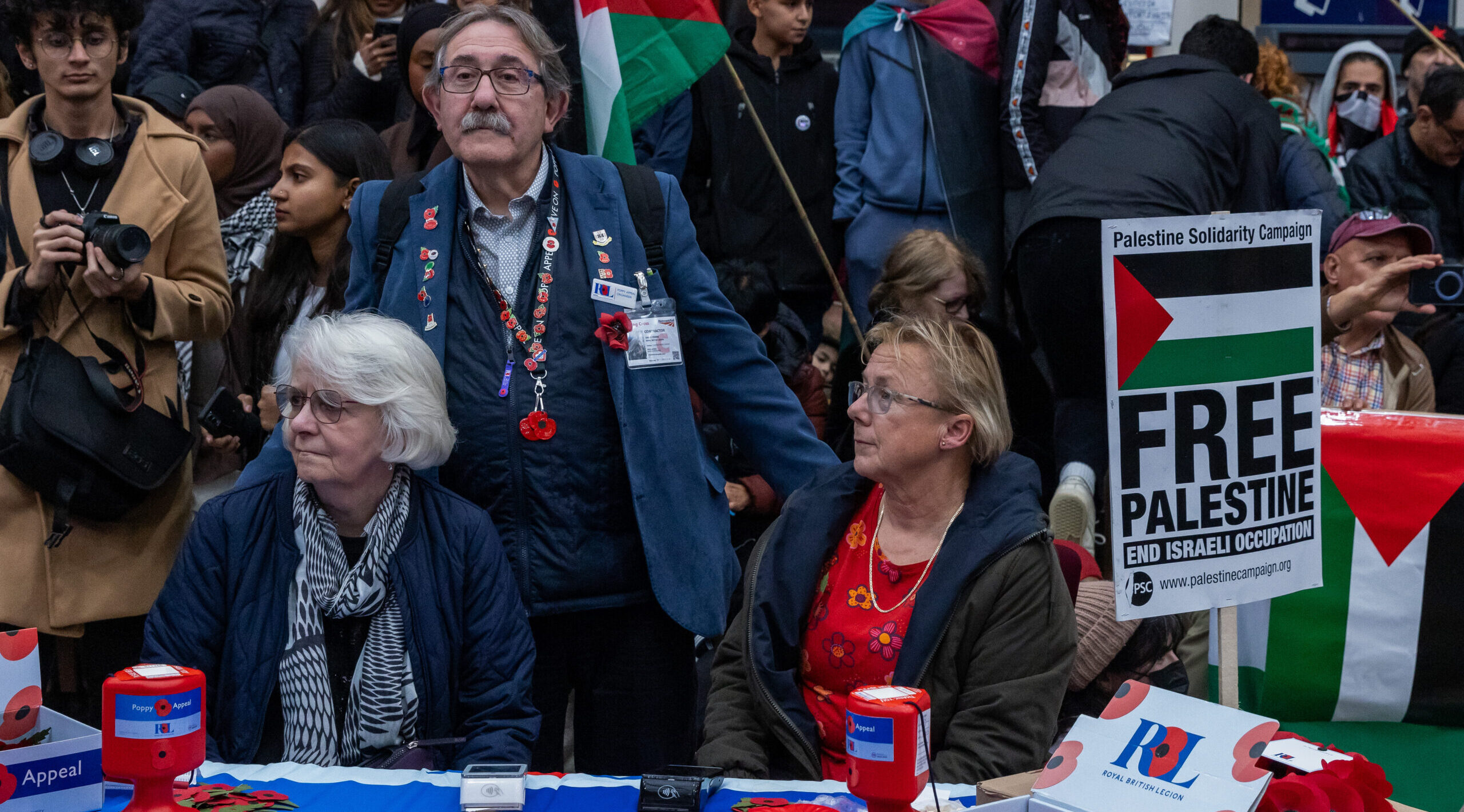 Poppy sellers during a pro-Palestine protest inside Charing Cross station this month. Credit: Getty 