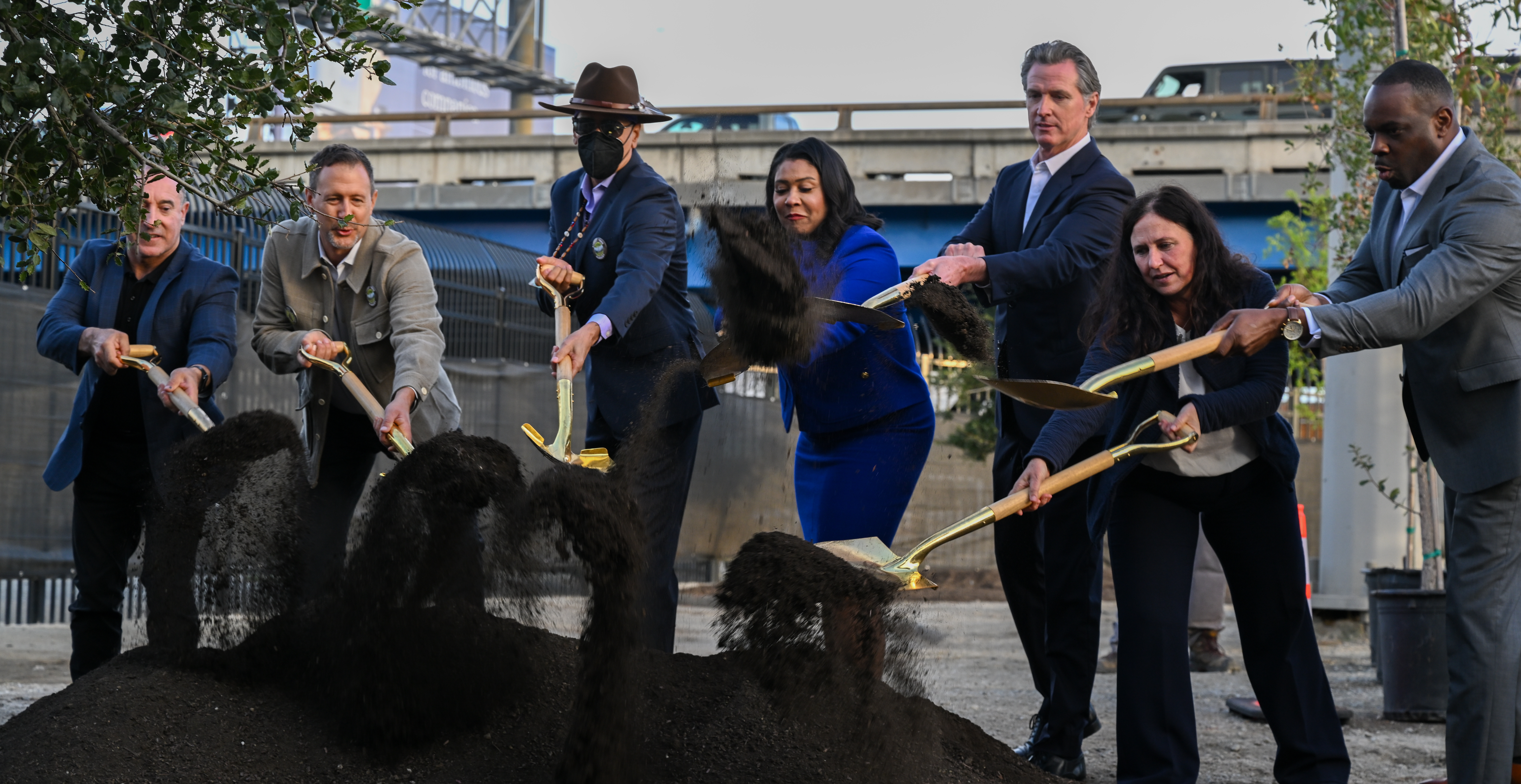 Is Gavin Newsom (third from right) finally getting his hands dirty? Credit: Getty
