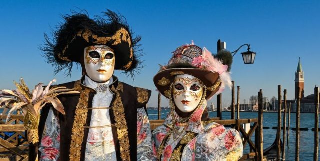 Behind Venice's masque. (MIGUEL MEDINA/AFP via Getty Images)