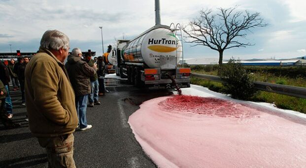 CAV spilling Spanish wine onto a French motorway in April 2016. Credit: Raymond Roig/Getty