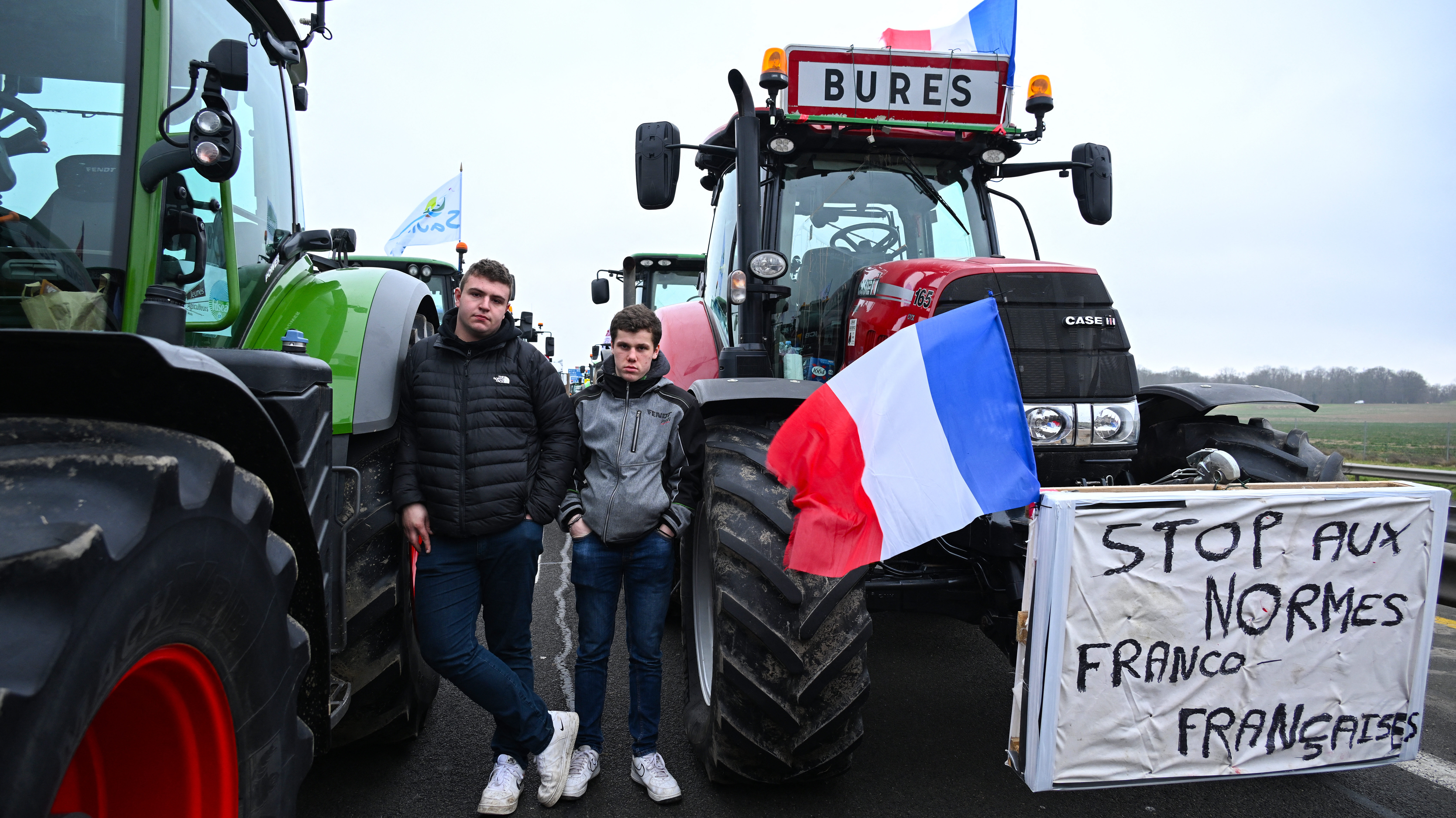 Young farmers block a highway near Paris on Tuesday. Credit: Getty  