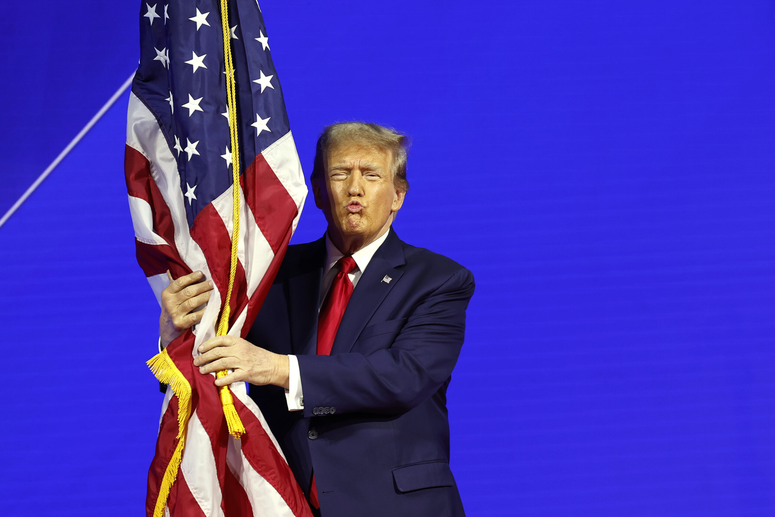 Donald Trimp shows off his patriotism at CPAC this week. Credit: Getty
