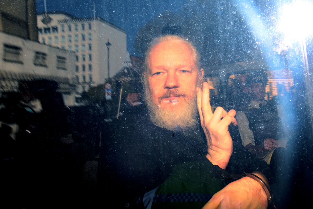 Was Julian Assange a precursor of the Proud Boys? Credit: Getty