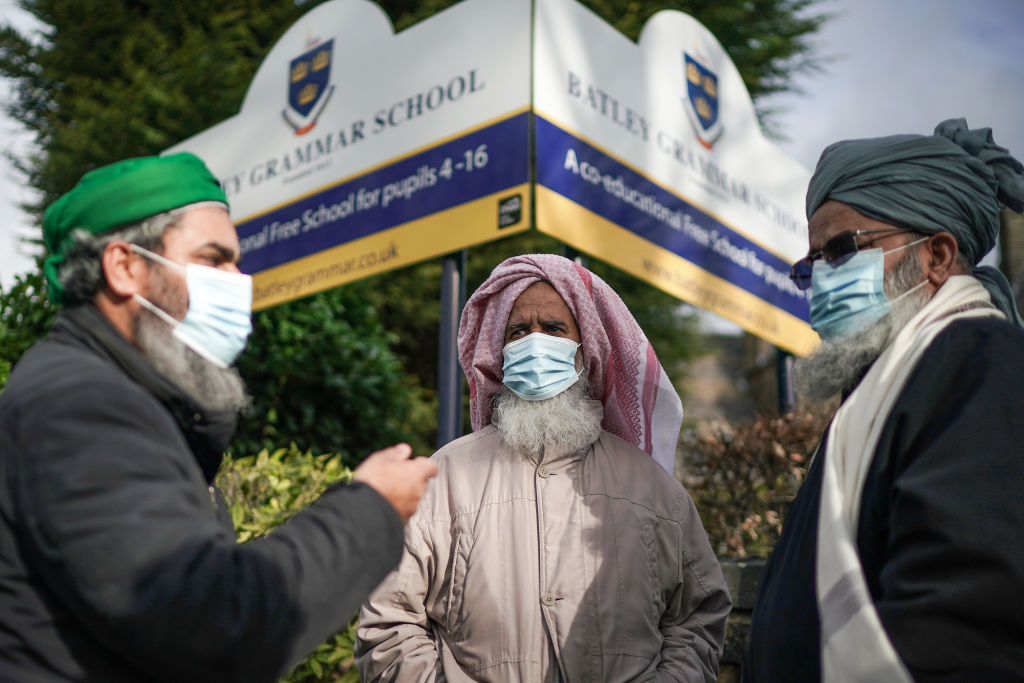 Protesters outside the gates of Batley Grammar School in 2021. Credit: Getty