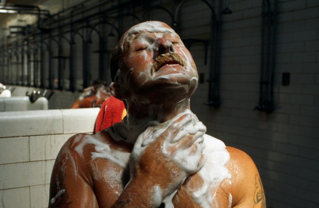 A miner washing in Tower Colliery, one of the last deep mines in Wales. (Gideon Mendel/Corbis via Getty Images)