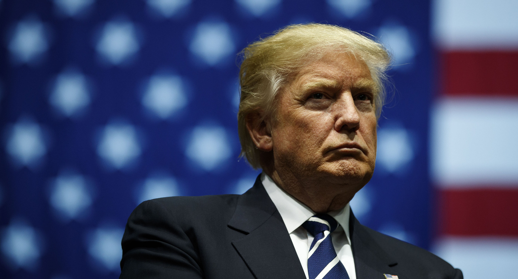 "Rapist, racist, fascist". Credit: Getty