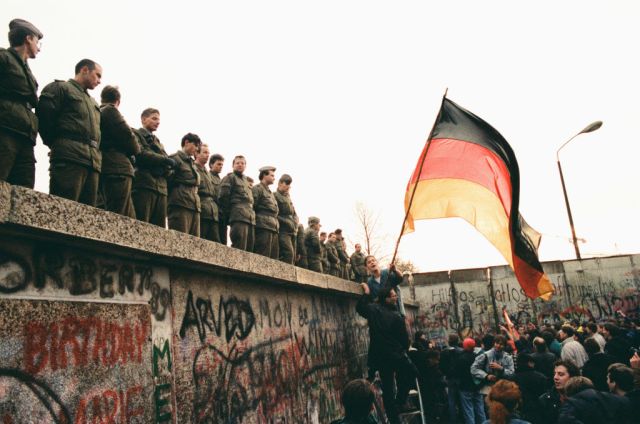 'East Germans, as a result, are expected to celebrate an origin story in which they feel they had no part' (Colin Campbell/Getty Images)