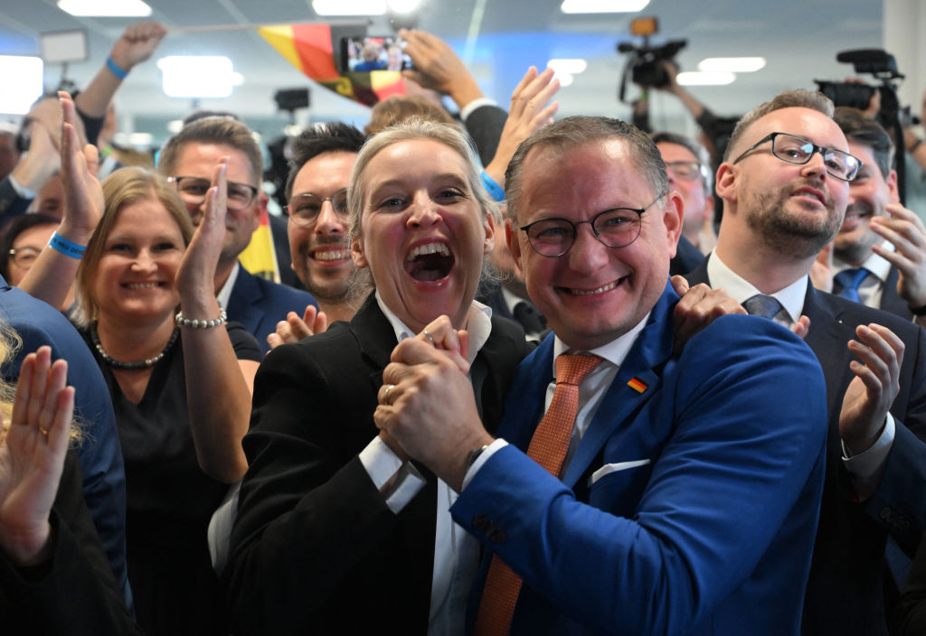 AfD co-leaders Alice Weidel and Tino Chrupalla celebrate initial results on Sunday night. Credit: Getty