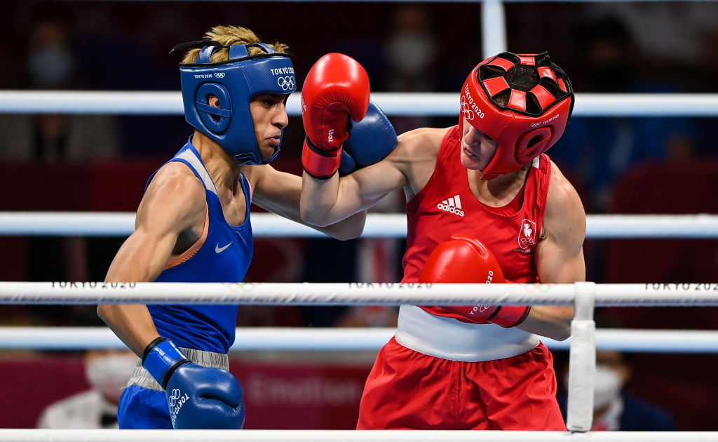 Imane Khelif (L) faces Ireland's Kellie Harrington during the Tokyo Olympics in 2021. Credit: Getty  