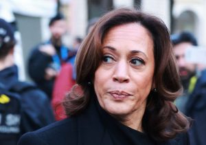 Who is behind Kamala Harris?