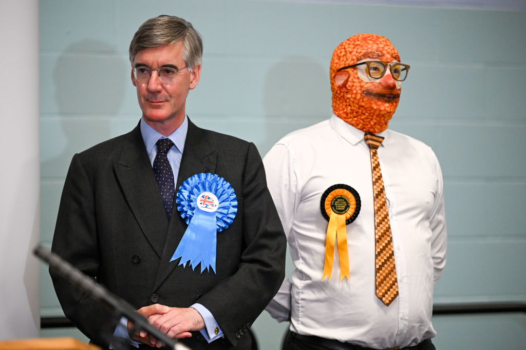 Jacob Rees-Mogg on election night (l). Credit: Getty