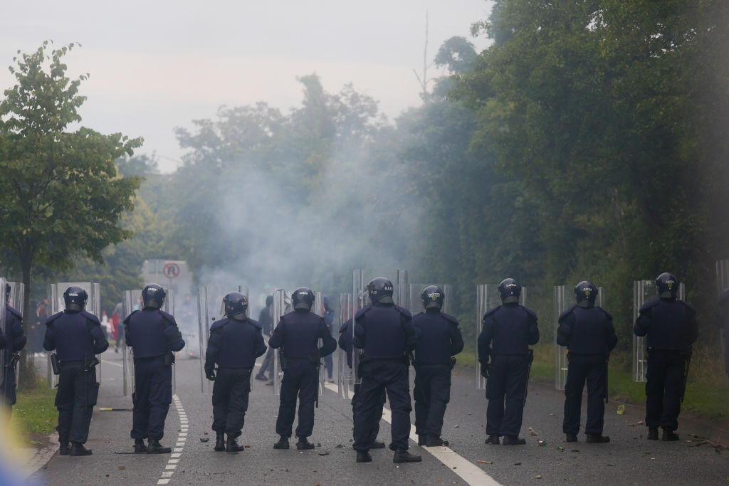Gardai clash with anti-immigration protesters in Coolock, North Dublin yesterday. Credit: Getty