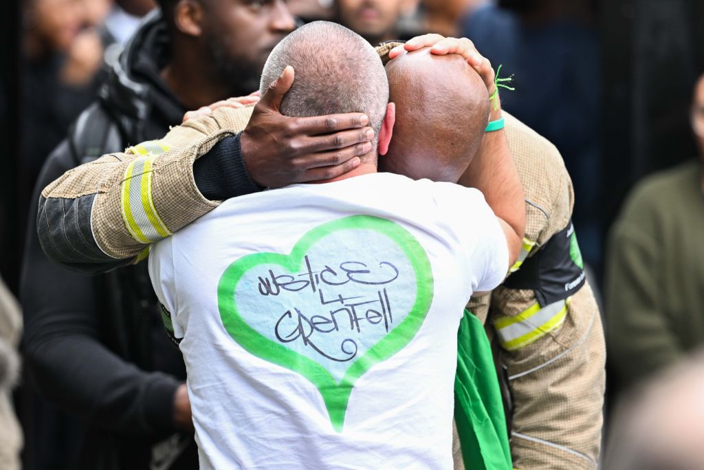 Attendees at an anniversary remembrance service this year for the Grenfell Tower fire. Credit: Getty