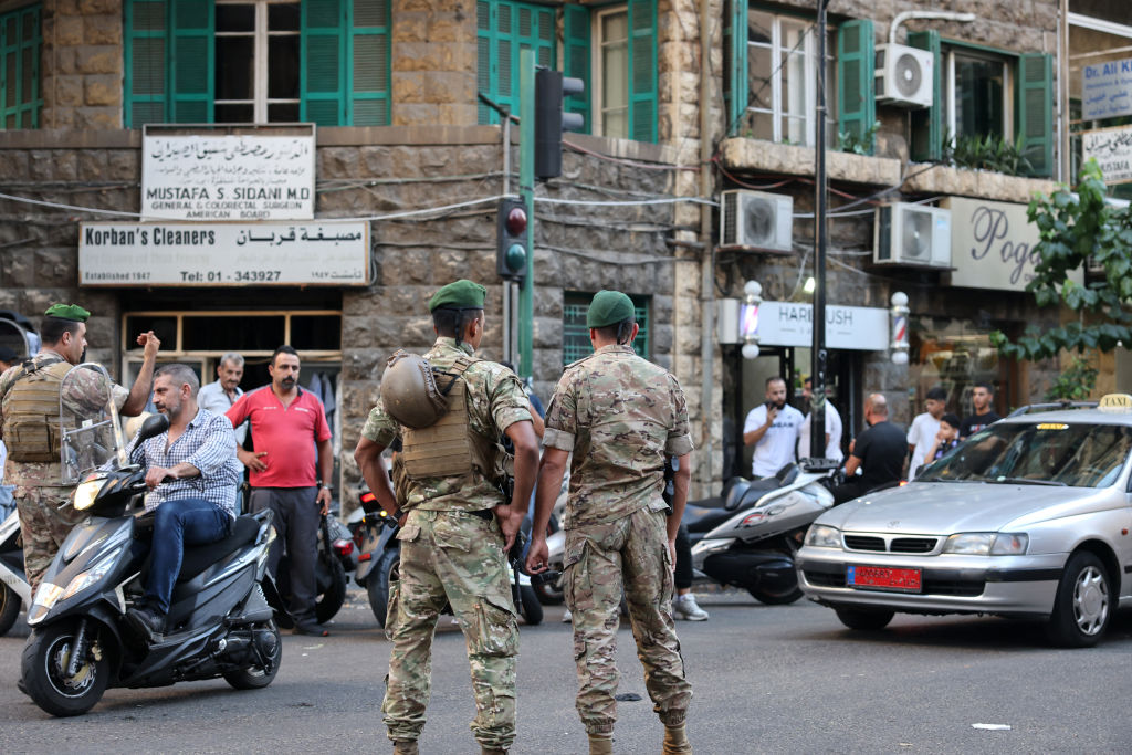 Lebanese soldiers in Beirut on Tuesday following explosions in several Hezbollah strongholds. Credit: Getty