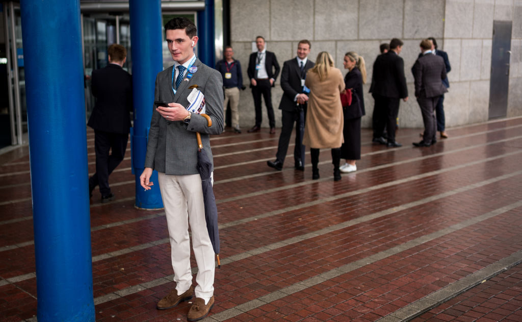 Delegates outside Conservative Party conference in Birmingham this week. Credit: Getty