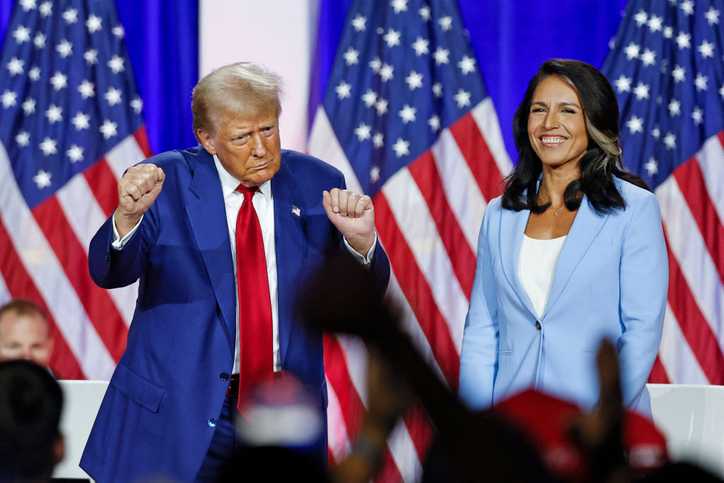 Donald Trump campaigns with Tulsi Gabbard in Wisconsin in August. Credit: Getty